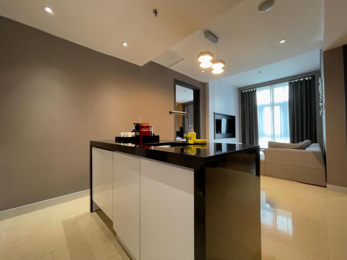 ホテル フレイザー プレイス プテリ ハーバー ヌサジャヤ エクステリア 写真 A kitchen island in a condominium
