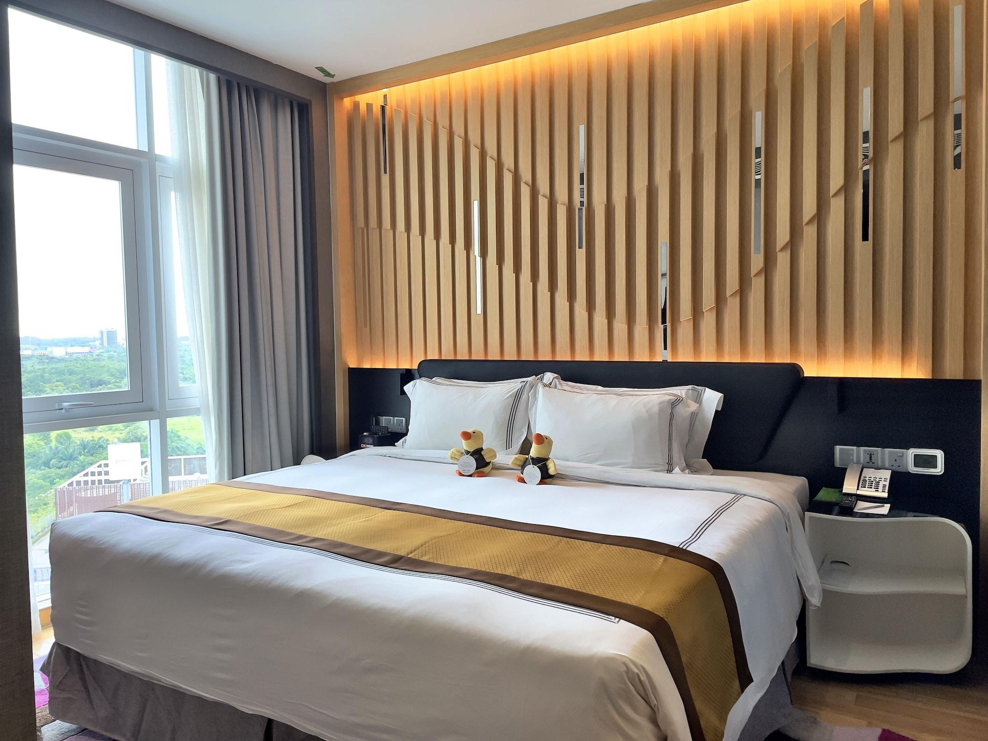 ホテル フレイザー プレイス プテリ ハーバー ヌサジャヤ エクステリア 写真 A bedroom in a hotel