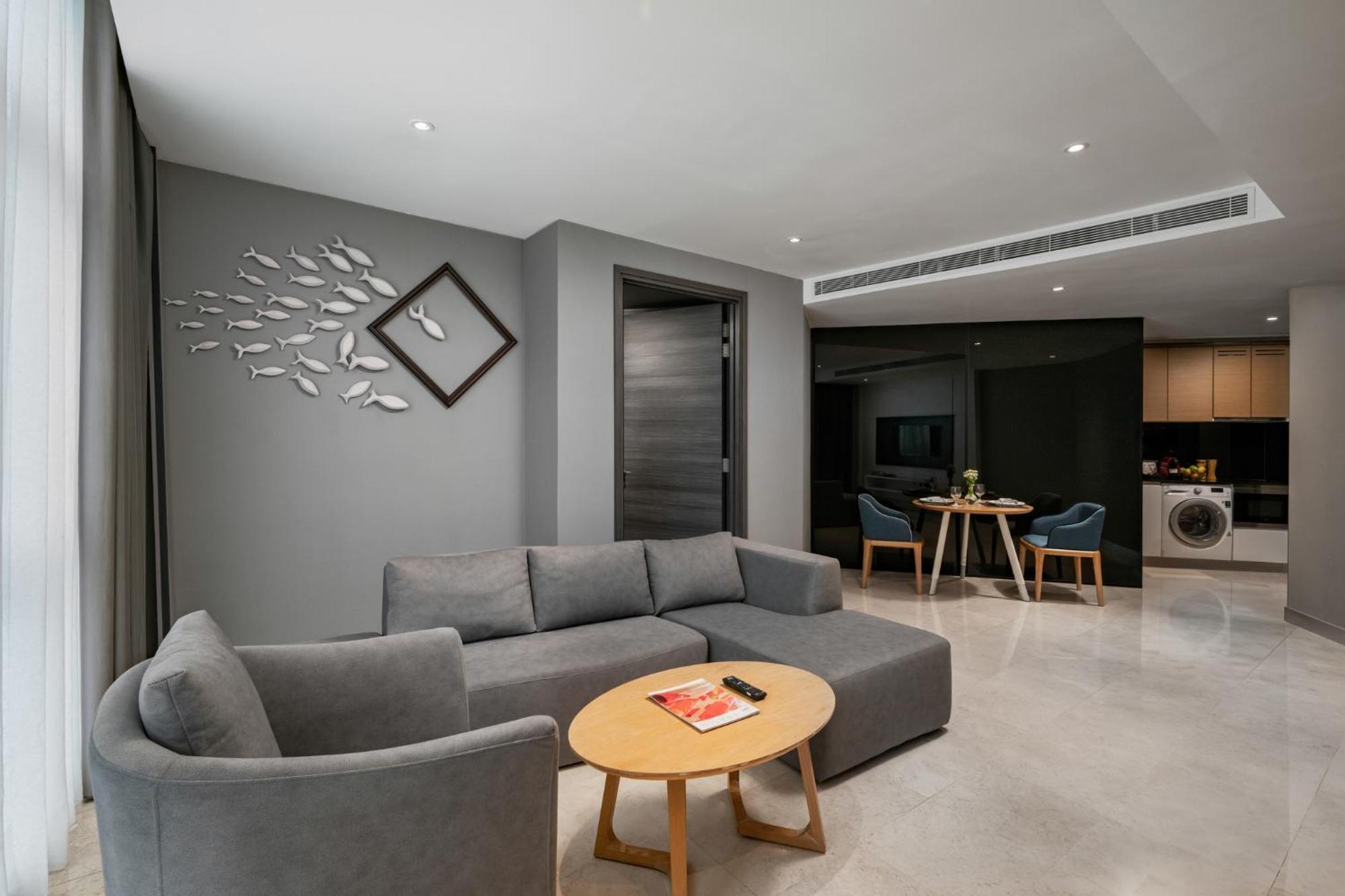 ホテル フレイザー プレイス プテリ ハーバー ヌサジャヤ エクステリア 写真 A living room in a serviced apartment in Singapore